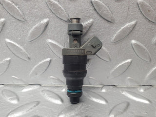 W124 fuel injector used OEM