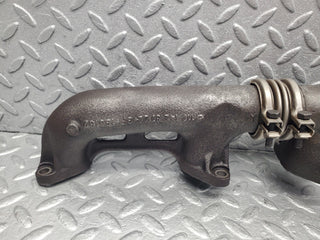 W126 Coupe exhaust manifold left used OEM