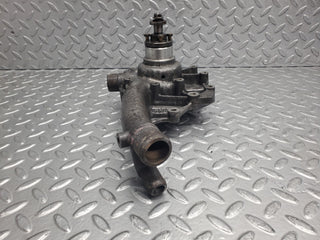 W123 water pump used OEM