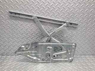W140 front left power window regulator used OEM