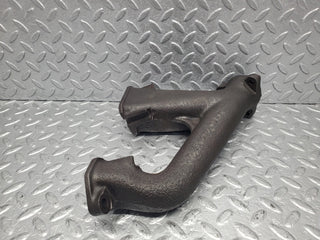W112 exhaust manifold 4-6 used OEM