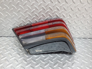 W124 tail light left side used OEM