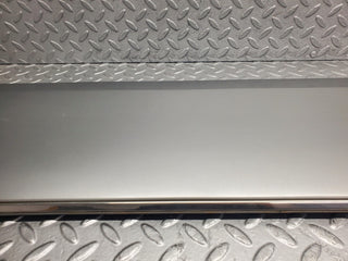 W124 Wagon front left door lower trim used OEM