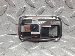 W123 Wagon chrome frame door opener left used OEM