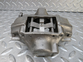 W124 Coupe rear left brake caliper used OEM