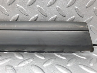 W124 front left door lower moulding trim used OEM