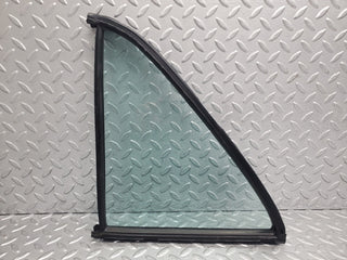 W123 rear left quarter window glass used OEM
