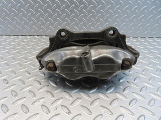 W221 front left brake caliper used OEM