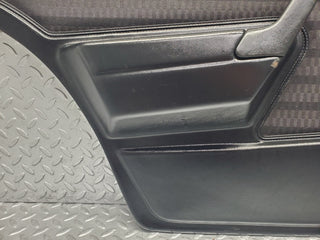 W201 Baby Benz rear left door card black used OEM