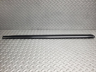 W123 front left door lower moulding trim used OEM