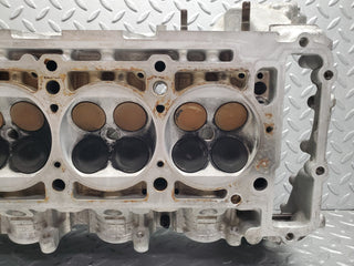 W124 Wagon cylinder head used OEM