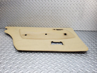 W123 rear left door card beige used OEM