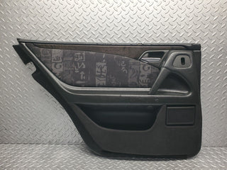 W210 rear left door card used OEM