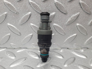 W124 fuel injector used OEM