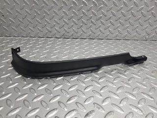 R107 SL headlight lower trim right side used OEM