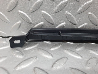 W202 under headlight trim right used OEM