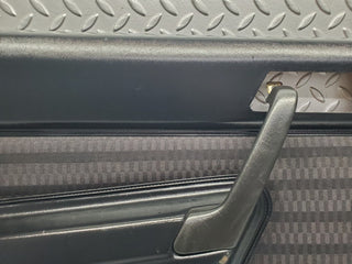 W201 Baby Benz rear left door card black used OEM