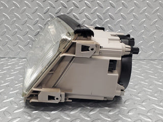R129 SL xenon headlight left used OEM
