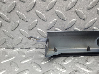 W124 Cabriolet under headlight trim left side used OEM