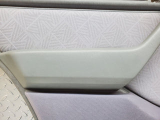 W124 rear left door card grey used OEM