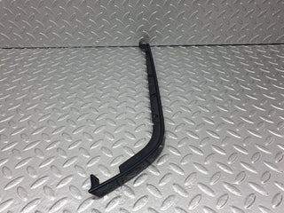 W202 under headlight trim right used OEM