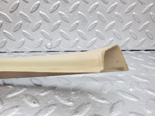 W126 front left door window frame cover used OEM