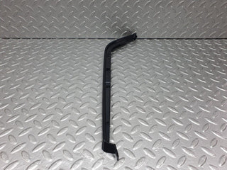 W202 under headlight trim right used OEM