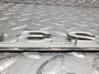W123 trunk badge logo emblem used OEM