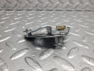 W123 front left seat belt bracket used OEM