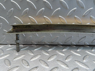 R107 SL left door window channel front used OEM