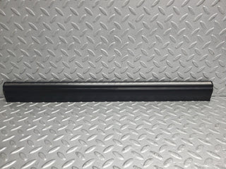 W123 front left door lower moulding trim used OEM