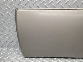 W124 rear left door lower moulding used OEM