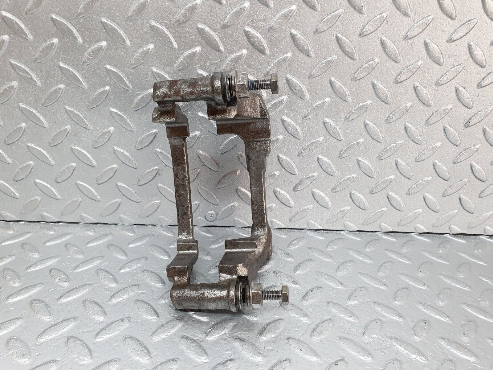 43720 Mercedes-Benz C126 380SEC Coupe Front Left Brake Caliper Bracket