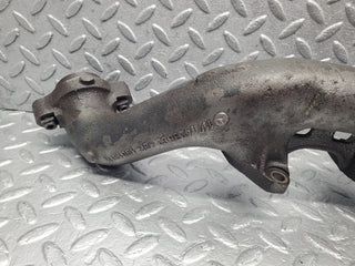 W126 Coupe exhaust manifold left used OEM