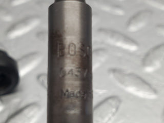 W123 fuel injector used OEM