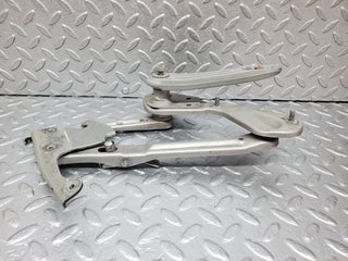 R129 SL bonnet hinge left used OEM