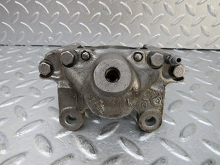 W124 Coupe rear left brake caliper used OEM