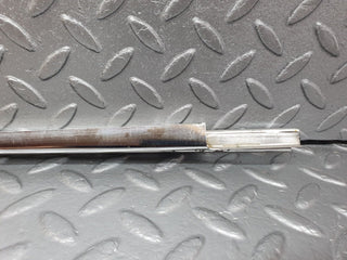W108 rear left door window chrome channel used OEM