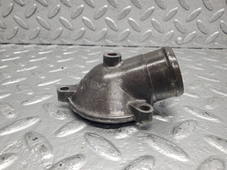 W123 thermostat housing used OEM