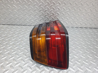 W124 tail light left side used OEM