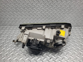 W202 headlight left side used OEM