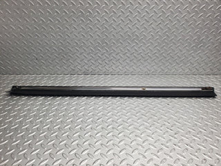 W123 front left door lower moulding trim used OEM