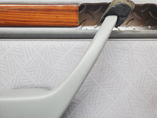 W124 rear left door card grey used OEM