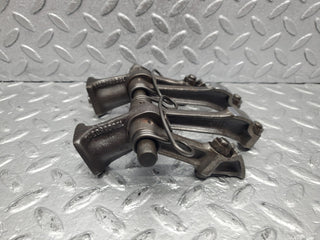 W112 rocker arm support with arm and shaft used OEM