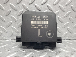 W210 door control unit front left used OEM