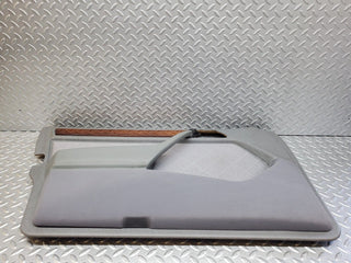 W124 front left door card grey used OEM