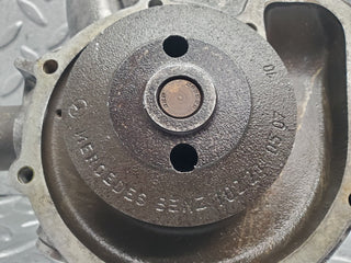 W123 water pump used OEM