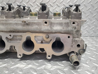 W124 Wagon cylinder head used OEM