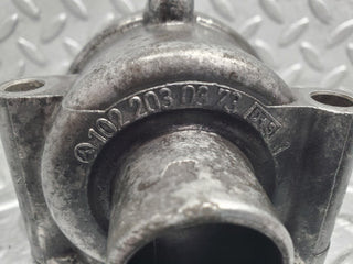 W123 thermostat housing used OEM