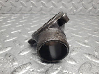 W123 thermostat housing used OEM